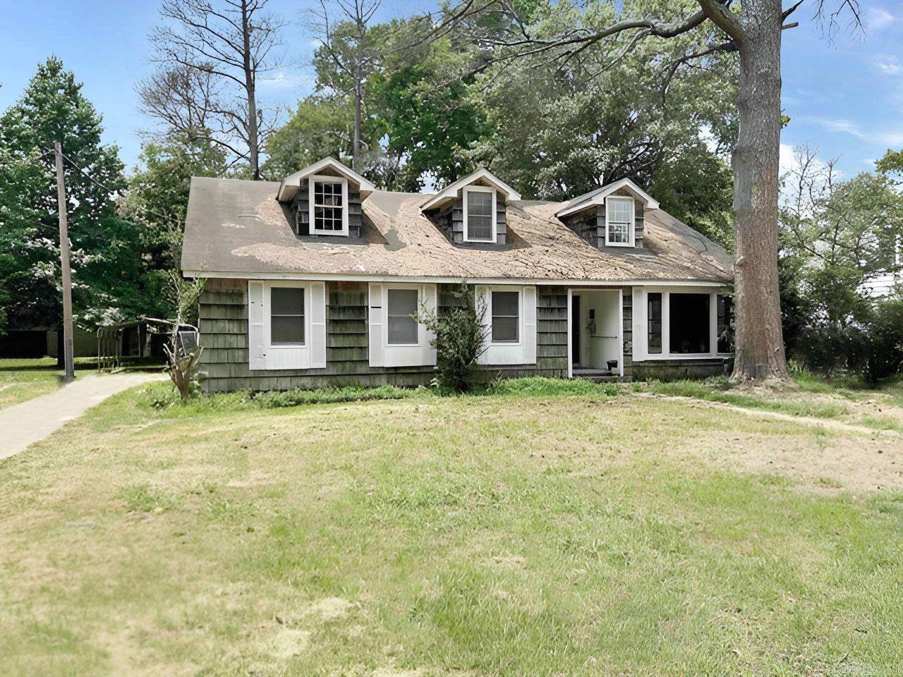 This home has tons of potential. Schedule a tour today. Home will be sold AS-IS. Agents see agent remarks.