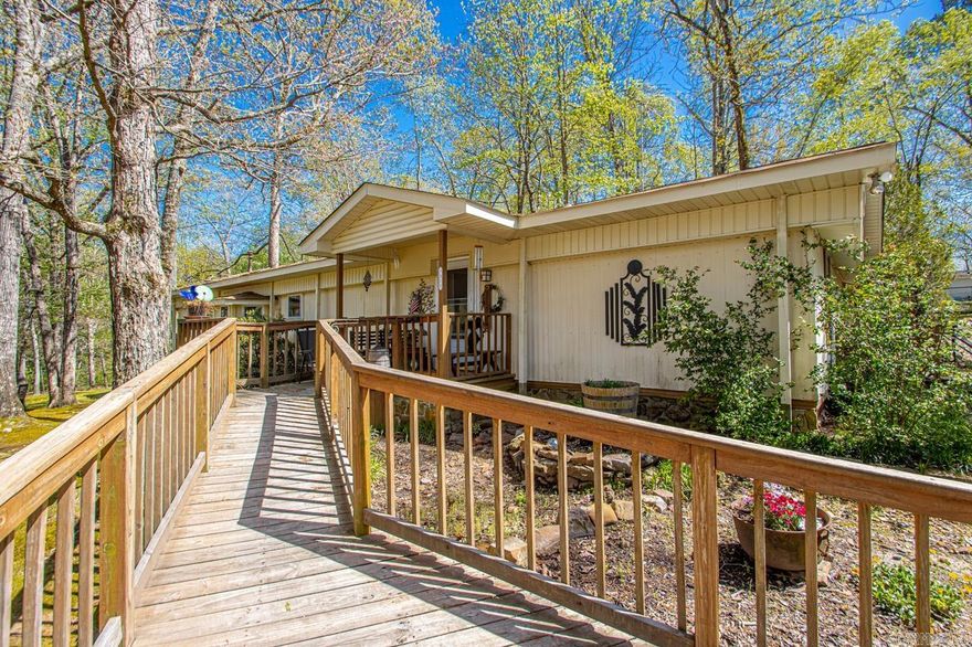 Take a look at this amazing opportunity to have your very own family compound or community of rentals with plenty of room to add more! This property has over 10 acres featuring a beautiful, creek fed pond and 6 homes/mobile homes. 7312 Bethany Ln is a very nice 2 bed, 2 bath mobile home that has been added onto and features a great back yard with a outdoor kitchen area that is perfect for entertaining! 7407 Bethany Ln is a cozy 1 bed, 1 bath home with beautiful view of the pond and a large, attached shop. 7404 Bethany Ln is a very sturdy 2 bed, 1 1/2 bad mobile home that has been added onto and has a covered porch offering pond views. 7406 Bethany Ln is a 1 bed, 1 bath home that could possibly be a 2 bedroom with tons of options. 7401 Bethany Ln is a 4 bed, 1 bath home that needs lots of work but could be a nice place with some work and TLC! There is also a mobile home on the left as you enter the property that also needs work. Behind the pond you will find plenty of acreage that is elevated and could make for a beautiful building spot or room to add more homes! This is truly a unique property and offers great opportunities for large families, investors and wildlife enthusiasts!!!