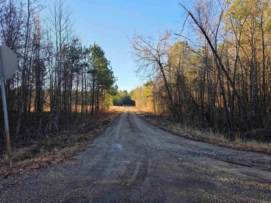 If you are looking for peaceful country living, this lot is it.  It is located in the Woodlawn Community of Cleveland County on a cul-de-sac road and is perfect for building your new home. Utilities are present at the road.  It is buyer's responsibility to do a perc test. Give me a call today.