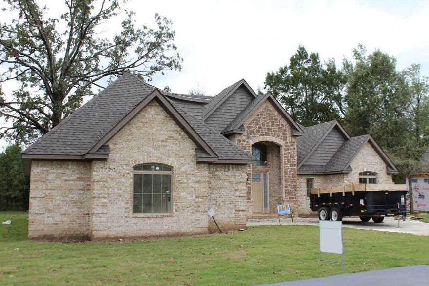 Brand new construction on a corner lot in the Nettleton School District. The eat-in kitchen has a breakfast bar. There is a separate dining room. The master suite has a jetted tub. The bonus room could be a fourth bedroom. Other amenities include built-ins, a two car garage and a laundry room.