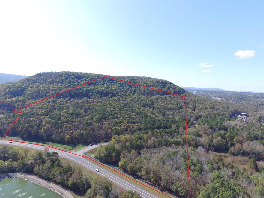 88 acres m/l with approximately 1500 feet of highway frontage. This property is outside the city limits, but very close to downtown Heber Springs. Lots of possibilities here!