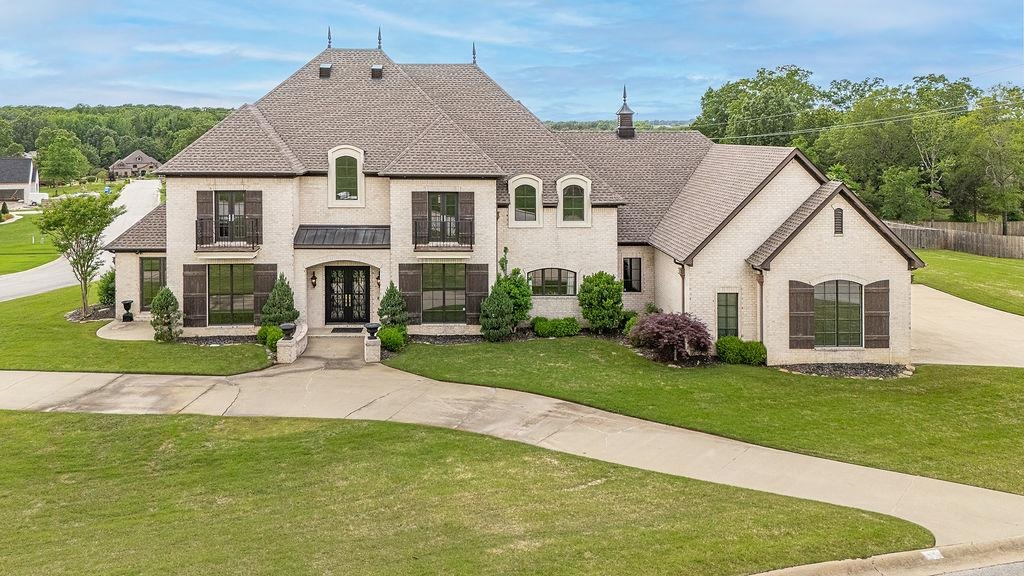 Welcome to a spacious, charming retreat in the highly sought-after Dunwoody/Huntcliff area, located in the top-rated Valley View school district. This French-inspired home offers over 6,500 sq ft of thoughtfully designed living space ā and it truly has it all. Enjoy the convenience of two luxurious master suites on the main level, multiple living and dining areas, and a chefās kitchen that checks every box: a butlerās pantry, new gas range, wine fridge, and more! Upstairs, two staircases lead to four large bedrooms, three full baths, oversized closets and a movie/game room thatās perfect for entertaining or relaxing. Throughout the home, you'll find stylish updates like renovated flooring, oversized bathrooms, a new roof (2022), recent new HVAC and upgraded lighting. Storage wonāt be an issue with incredible closet space and a built-in saferoom/tornado shelter at the heart of the home for added peace of mind. Plus, foam spray insulation in the attic offers big energy savings. Set on a quiet cul-de-sac with a fully fenced, 3 car garage and sprinklered and serene yard, this home is minutes from work, dining, and shopping. Wired up by Sound Concepts for audio and video. Tour today!