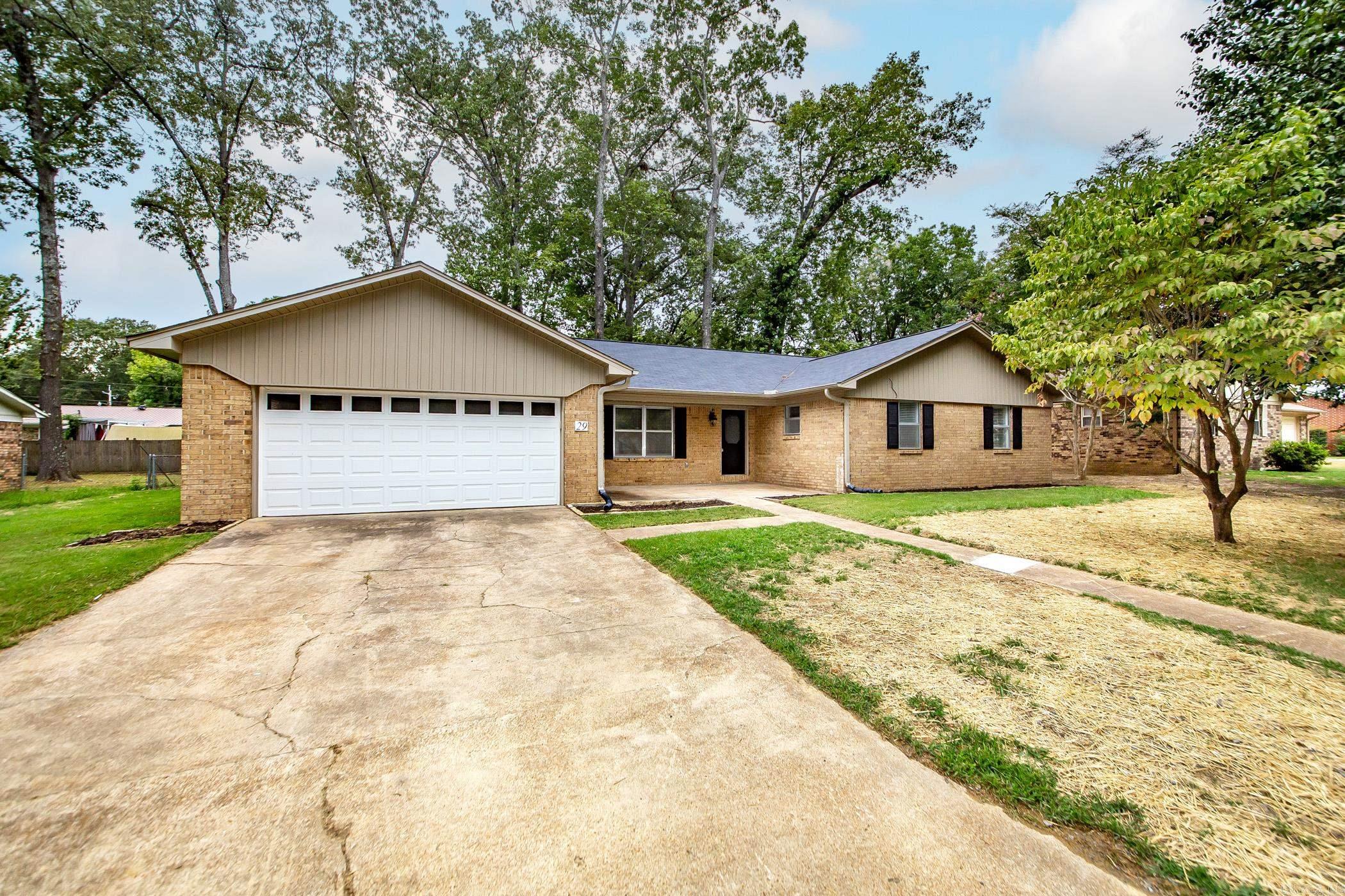 This recently remodeled home is offering 4 spacious bedrooms and 2 1/2 baths. Step inside to fine upgraded finishes throughout. Featuring 2 different living areas, a living area and a den featuring an electric fireplace give the family plenty of room to spread out. Solid surface countertops in kitchen and bathrooms. The spacious bedrooms provide ample closet space. The home has Luxury vinyl plank though out most of the house with tile in the entry and kitchen. Step outside and enjoy the shade under the mature oak tree canopy, making those summer cook out more enjoyable. Additional feature include an updated HVAC, Water Heater and appliances. AGENTS see remarks.