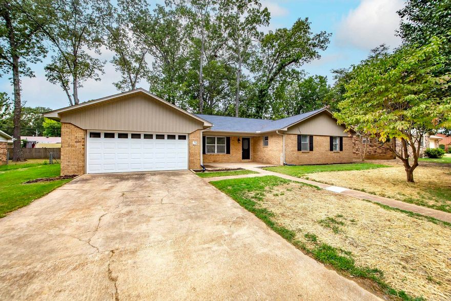 This recently remodeled home is offering 4 spacious bedrooms and 2 1/2 baths. Step inside to fine upgraded finishes throughout.  Featuring 2 different living areas, a living area and a den featuring an electric fireplace give the family plenty of room to spread out. Solid surface countertops in kitchen and bathrooms. The spacious bedrooms provide ample closet space.  The home has Luxury vinyl plank though out most of the house with tile in the entry and kitchen.  Step outside and enjoy the shade under the mature oak tree canopy, making those summer cook out more enjoyable. Additional feature include an updated HVAC, Water Heater and appliances.  AGENTS see remarks.
