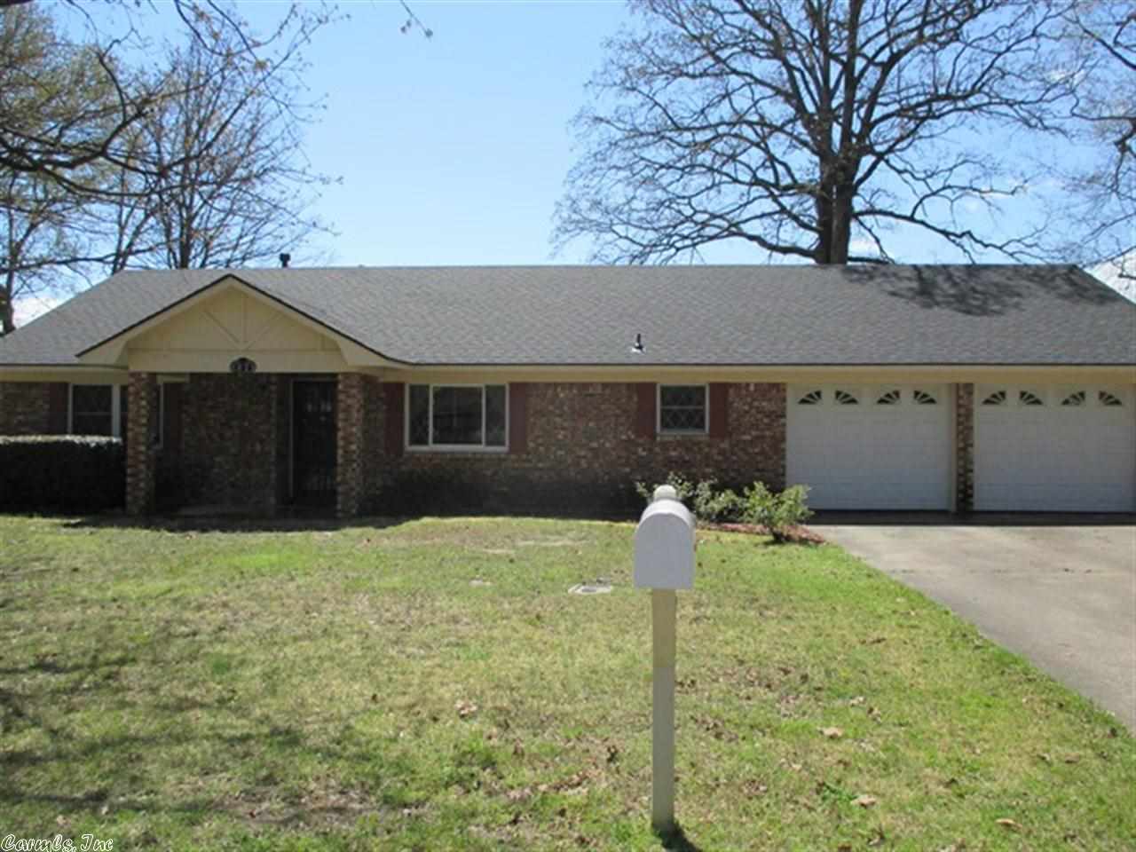 Great West Conway home in Smoking Oaks Sub. Home features fireplace, large laundry room with sink, vinyl insulated windows, covered patio, privacy fenced back yard, 10x14 storage building, storm cellar and new shingles in 2013!