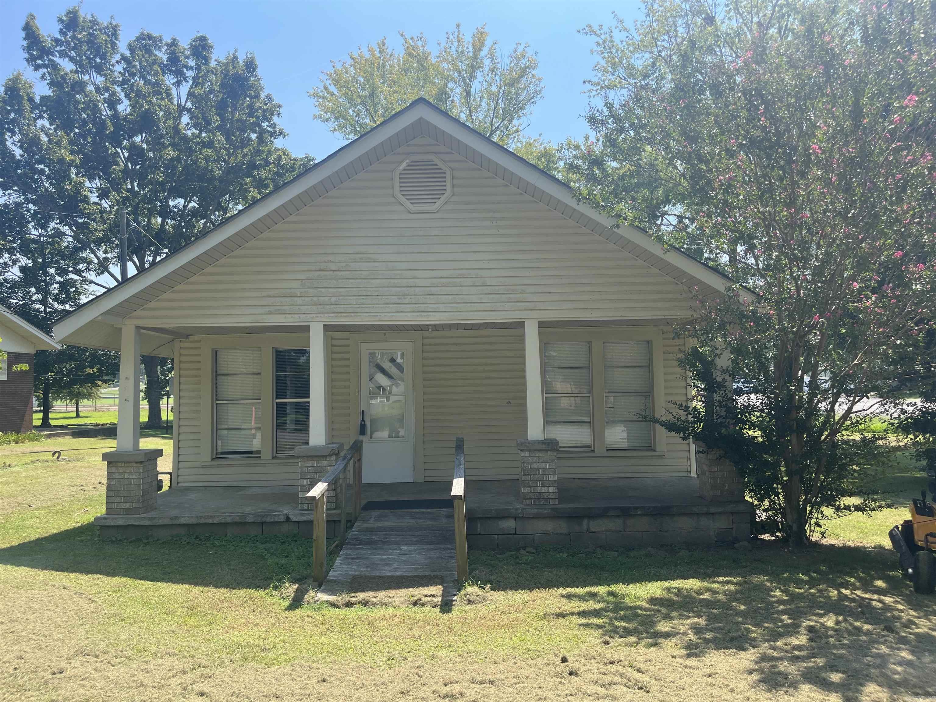 Precious house close to school and church! Football field in your back yard! Open floor plan and storage building out back! Come see it today!