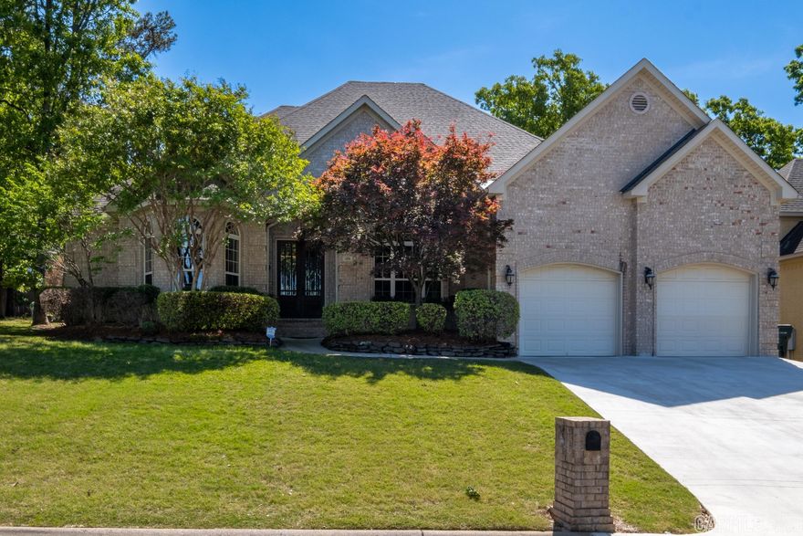 Spectacular 1 1/2 story Home located in the desirable Villages of Wellington. Offering 4 BRs and 2 1/2 Baths on main level and OVERSIZED Bonus room upstairs, hosting an en suite bath and large walk-in closet make this home a RARE FIND. This spacious floor plan gives you the luxurious feel of one-story living. Beautiful hardwood floors and tile throughout downstairs. The substantial Kitchen features Granite countertops, Gas cook top and Stainless-steel appliances. The living area and Hearth room have an amazing 2-sided fireplace to provided warmth and ambience to both areas. Large Closets, and large walk in attic space provides you with storage galore. Corner lot with large back lawn that offers privacy with green space coupled with being in walking distance from neighborhood park and pool make this a must see.