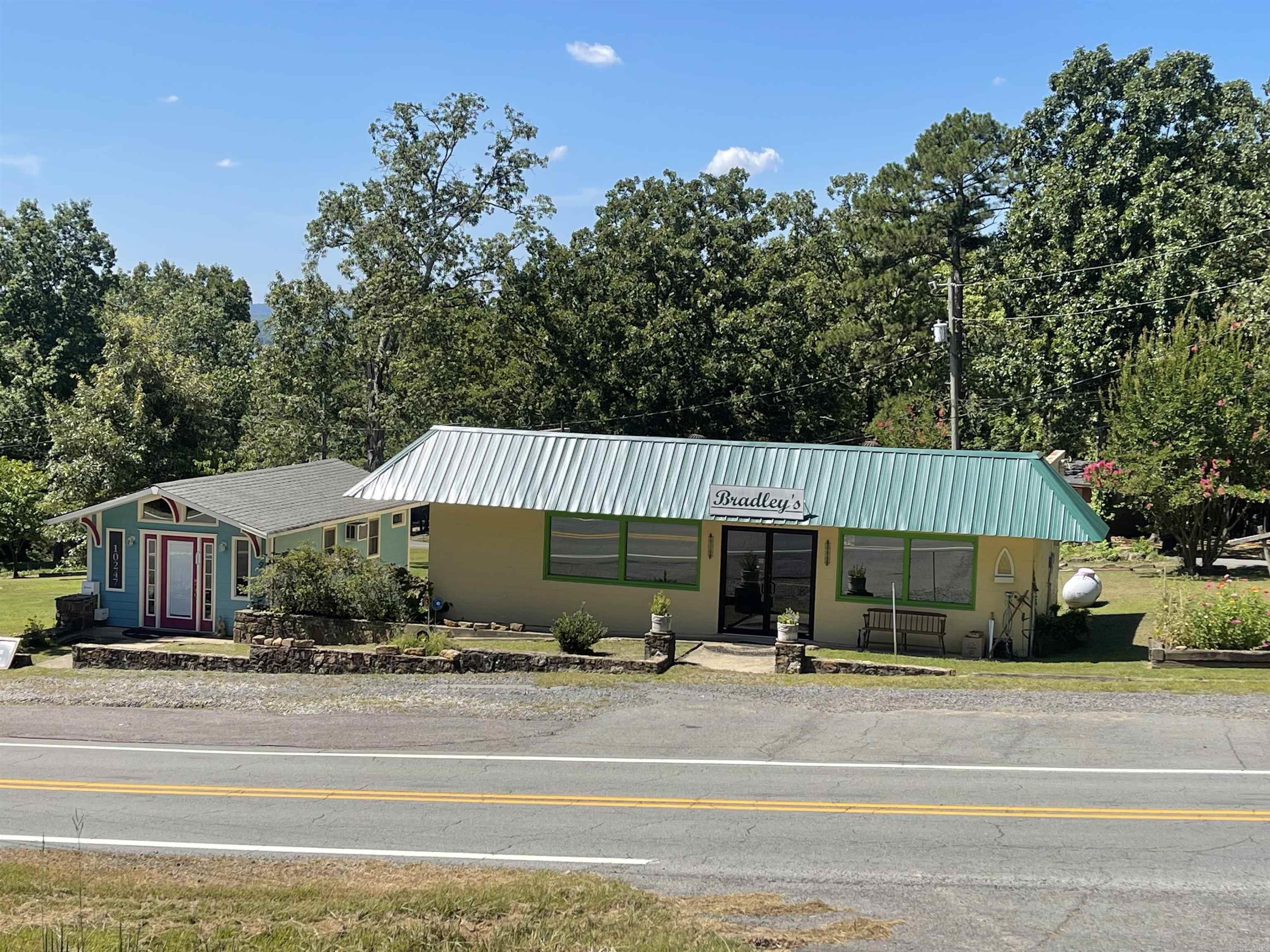 Great location for commercial or residential. Consists of two front buildings and a shed in the back. The largest is 1,120 square feet. The small one next door is 336 square feet. Lots of potential uses for these, and close to the lake. Use them as businesses, or turn them into residential full-time, part-time, or vacation rentals.