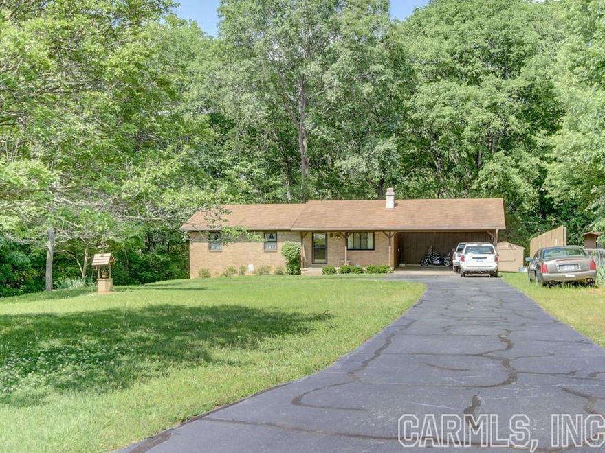 ATTENTION HORSE LOVERS!!!! 4.12 acres in a sought-after subdivision. Offers quiet roads for trail riding with access from there to the saline river the seller says. Close to Harmoney Grove Schools in Haskel. Location, Size, Land. ONE OWNER HOME! Close to major employers and easy commute to Little Rock/Universities.  Main Level of home has 3 bedrooms/2 baths/living and kitchen/dining combination.  Lower-level basement has living area, bedroom and bath with separate entrance.  Possibly could be extra income producing space! The property front has mature shade trees and the back is wooded acreage.  Privacy galore.  Nice area of quality homes.  Come see this cute home!