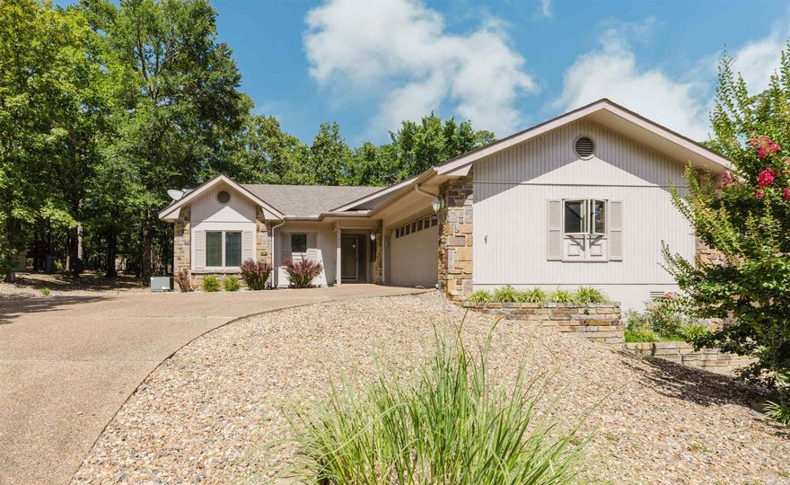 GORGEOUS, Updated and MOVE IN ready home in a great location in the Village. You will fall in love when you pull into the driveway. The curb appeal is AMAZING! Extra landscaping, side entry garage and extra wide pebbled concrete driveway. Step into this open concept home with beautiful laminate flooring, gas log (propane) fireplace, granite slab countertops in kitchen and bathrooms, SS appliances. Master suite apart with jet tub, walk in shower and walk in closet. Large mudroom with built in cabinets. 160 Square foot sunroom looking out into the gorgeous backyard, fenced and a deck! Nice sized extra rooms and one with a Murphy Bed! 2 car garage with workshop! 2 newer Water heaters! Roof only 1 year old! You won't want to miss out on this one! Check out all the Village has to offer! https://www.explorethevillage.com/