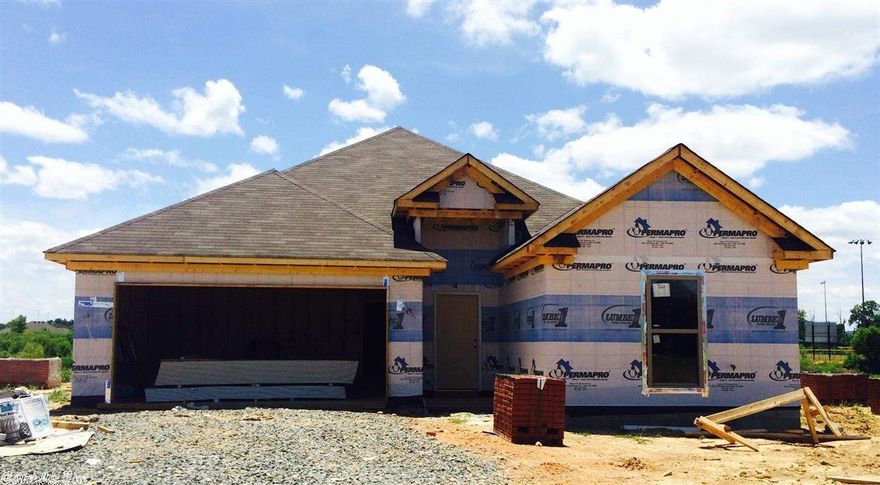 Distinctive New Construction  by Jeff Fuller Homes! Elegant 10 Ft. Ceilings... Romantic Woodburning Fireplace... Luxurious Master Bath with Dual-Head Shower, 2-Sink Vanity, and Walk-In Closet...  Stainless Steel Appliances... Premium  Kitchen Countertops... Indirect Lighting Thruout... Double Crown Molding... Covered Back Patio... (Seller is Licensed Real Estate Agent)