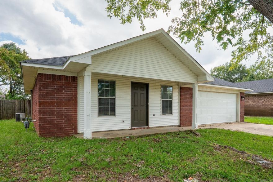 Perfect for whether you're looking for a turn key investment property or a low maintenance home. New roof, flooring, fresh paint, new fans and light fixtures, new stainless dishwasher and stove...even the commodes are new. If that wasn't enough there's a brand new tankless water heater and garage door.   Convenient to interstate and within walking distance to shopping and several restaurants.