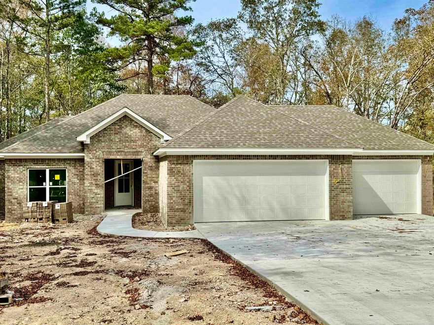 NEW construction with three car garage in progress near Glazeypeau Gate for super easy access to Highway 7 shopping and dining! Ideal location just minutes to Lakes, fitness center, golf, etc! Have the feel of seclusion but the convenience of groceries, medical, dining, etc. just 10 minutes away! Open floor plan with the newest finishes and large pantry! Laundry room accessible from hallway and from main bedroom! Main bedroom has exterior door to the covered back patio! All brick exterior with maintenance friendly landscape. Tray ceiling in main bedroom and raised in the living area! Common property to the rear! Taxes not yet assessed. Newly developed neighborhood in super convenient location!