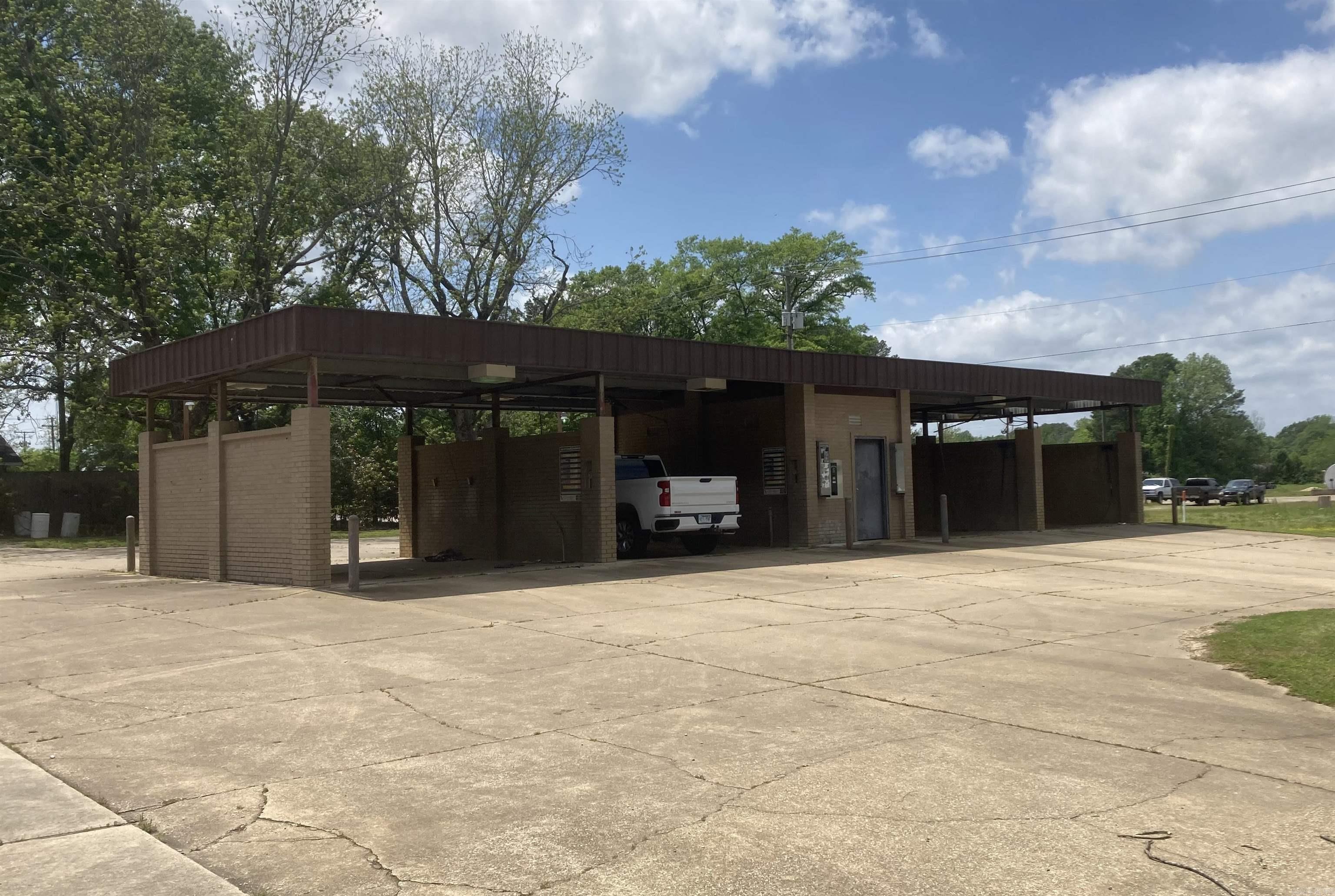 A great investment property with a lot of potential income. This four open bay car wash is in need of a little TLC and is back up and going as an income producer!