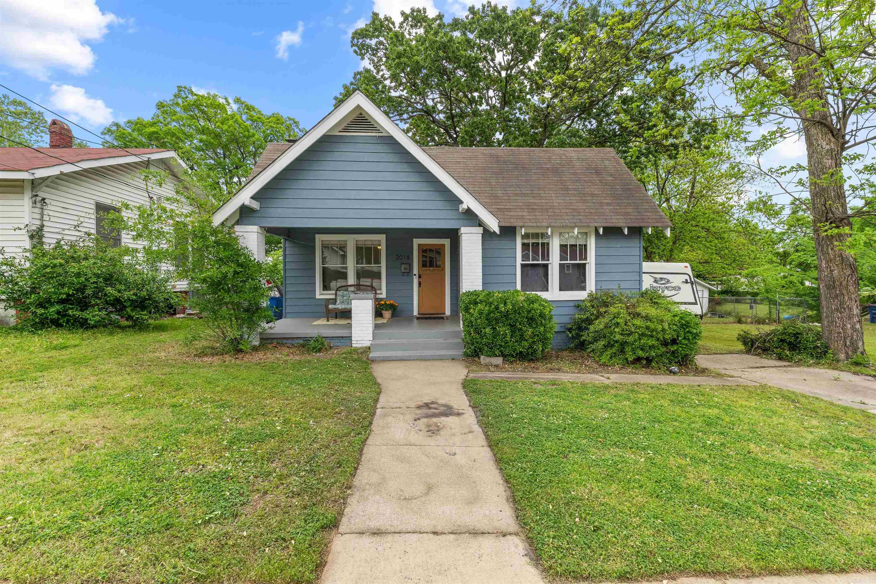 Beautiful 1938 North Argenta Craftsman, fully restored in 2021. Everything from restored wood windows, restored original flooring, stunning subway tile kitchen backsplash, huge front sitting porch - just add iced tea and a rocking chair or bench swing..... Appliances including the 5-burner gas stove were 2021. Big, pretty sunroom also holds the washer and dryer. Roomy bedrooms and beadboarded bathroom with coin mosaic tile floor. This house has awesomely updated finishes while keeping all of the craftsman 1938 charm. The fireplace is set up for ventless gas logs or make decorative as a focal point. You'll love the oversized,.31 acre lot and HUGE fully fenced backyard for the kids or fur babies to run and play. Equally close to Parkhill and downtown Argenta for dining / entertainment and having an interstate-free commute to downtown LR will be priceless.
