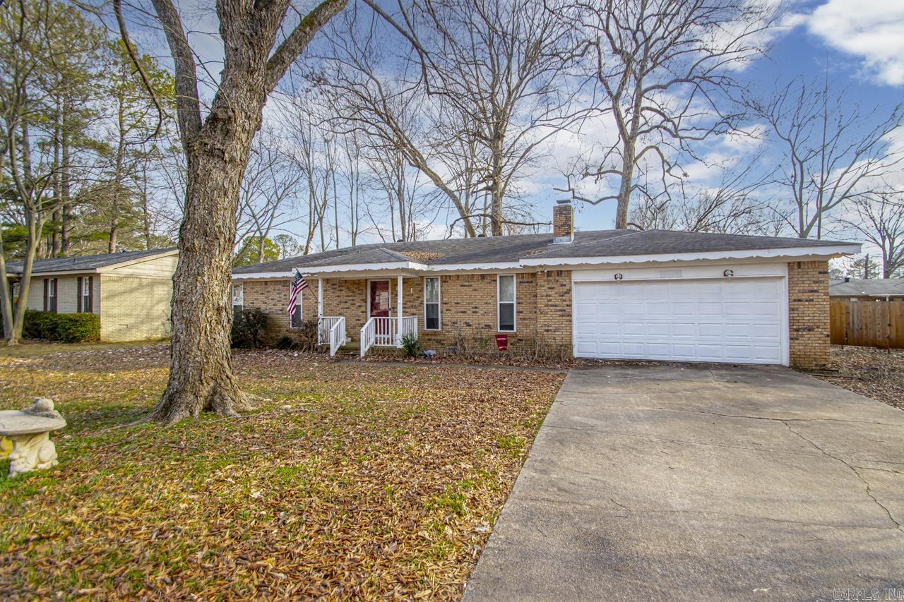 This charming home features a spacious two-car garage, an open-concept kitchen with abundant counter space and cabinetry, seamlessly flowing into a sophisticated dining area. Adjacent to the kitchen, a charming screened sunroom offers a serene retreat. The property boasts a lovely deck, complemented by a privacy fence, creating an ideal outdoor oasis. Inside, the inviting living space is enhanced by a cozy fireplace, perfect for refined relaxation. See Agent Remarks