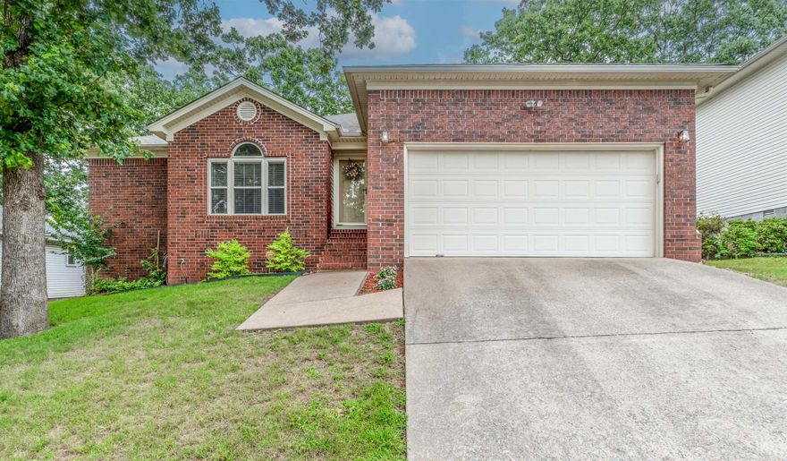 Great location on this super cute NLR home with lots of updates!  New roof 2025, new countertops and backsplash in kitchen 2024. Both bathtubs resurfaced in 2025.  Deck redone in 2024. Wi-Fi garage door opener in 2023. Outside light fixtures 2024.  New windows in 2021. Carpet and retaining wall redone a few years ago.  Refrigerator and storage building convey. Both bathroom countertops are updated.  Agents see remarks.