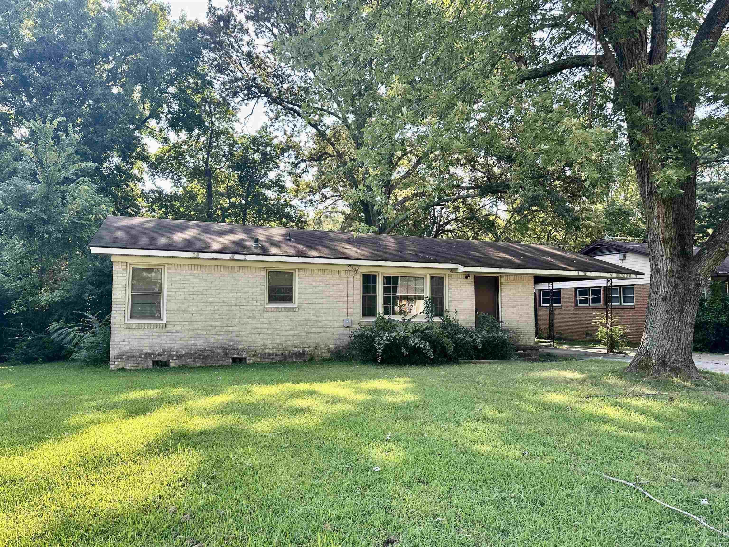 All brick, investment or handyman property. Hardwood floors are original but need TLC. Good sized kitchen and eating space. A handyman could fix it up and move in with a little bit of equity. Property to be sold as is.