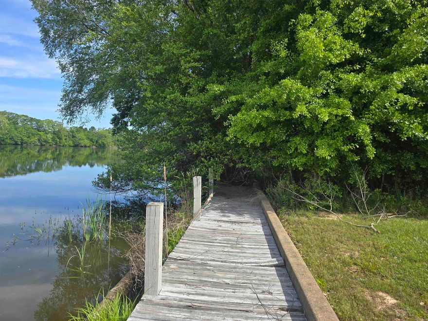 This lakefront property offers a prime building site for a dream home, nestled within a community designed for an active and social lifestyle. Located on Lot 1 Enchanted Terrace, this lot provides exceptional elevated views overlooking the water, making it a perfect canvas for a residence with expansive windows or tiered decking. Residents of this area enjoy access to a robust suite of recreational facilities: Golf & Racquet Sports: Proximity to a professional golf course and dedicated courts for tennis and pickleball. Social Hub: A central clubhouse serves as the heart of the neighborhood, hosting various community activities and social gatherings throughout the year. Location & Recreation The lot balances secluded lakeside living with convenient access to local attractions :Lake Catherine State Park: Just a short drive away, offering hiking trails, boat rentals, and the popular Falls Creek Falls. Downtown Hot Springs: Roughly 15–20 minutes away, providing easy access to historic Bathhouse Row, local dining, and boutique shopping.