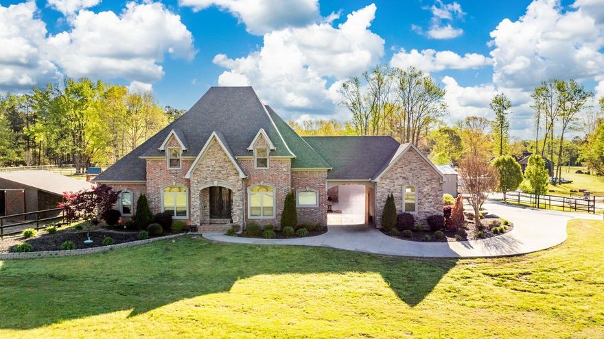 From the pool to the basketball court, to the stables, to all the square footage inside, this home has absolutely everything you could need! This beautiful custom home has 5 bedrooms 3.5 bathrooms with 4187 sqft all nestled on 3 acres! As you enter through the iron French doors you are greeted by the open living space with tall ceilings, lots of windows with a view of the outdoor oasis! This home encompasses stables and already fenced for horses! Too many extras to list them all! Call today for your tour!