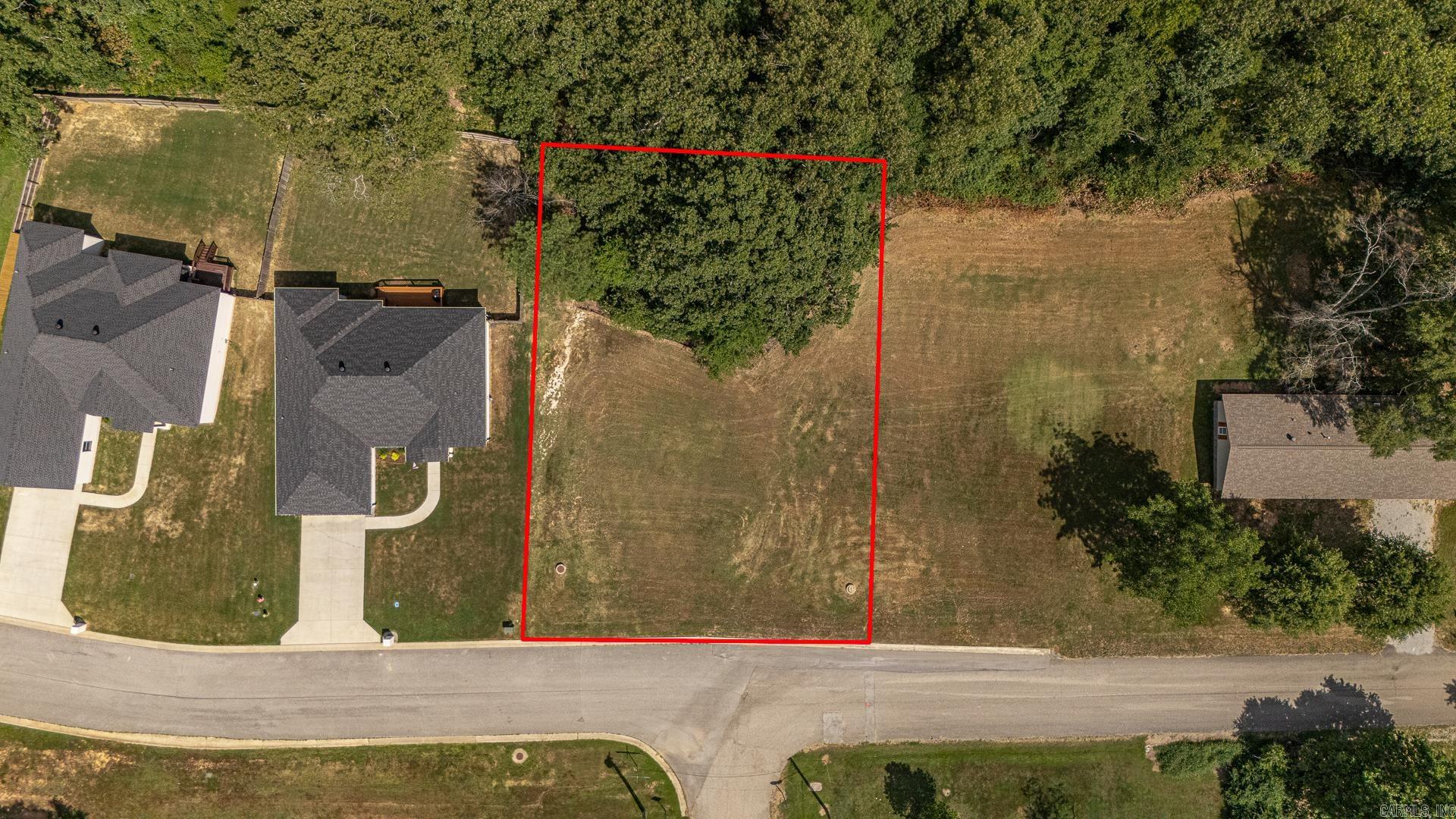 Building lot available on Johnwood Drive, located next to newer homes on Rockport. Great opportunity to build your next home in a convenient area. The lot has a gentle slope, offering potential for a basement walkout, or it can be filled for a slab foundation like nearby homes. Two side-by-side lots are available if you want extra space, or purchase the home at 5104 Johnwood and expand with the adjoining lots.