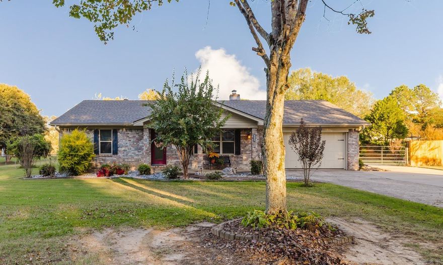 Nestled on nearly an acre of serene countryside, this beautifully updated three-bedroom, two-bath home perfectly blends modern comfort with spacious outdoor living. A brand-new roof ensures lasting peace of mind.  Stepping inside, you’re greeted by a bright, open floor plan highlighted by new flooring The living room is warm and inviting, Just beyond, the heart of the home—the newly remodeled kitchen—shines with contemporary style and thoughtful design. Featuring gleaming granite countertops, a stylish tile backsplash, and updated cabinetry, this kitchen is as functional as it is beautiful. The primary suite offers a peaceful retreat, complete with a private ensuite bath. Two additional bedrooms provide flexibility for family, guests, or a home office. Both bathrooms have been tastefully updated to complement the home’s modern aesthetic.For hobbyists, mechanics, or anyone in need of extra storage, the impressive 32x24 shop is a standout feature. With its own brand-new roof, this versatile structure offers endless possibilities—whether you envision it as a workshop, a home gym, a studio, or a place to store vehicles, tools, and equipment.Enjoy the outdoors in the screened in porch.