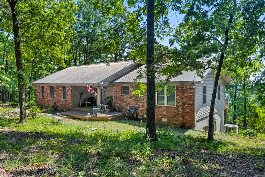 Discover the perfect blend of space, comfort, and stunning scenery with this exceptional property! Nestled on 12.72 acres, this home offers breathtaking views in every direction. With just under 3,000 square feet of living space, it features four spacious bedrooms, three full bathrooms, and several versatile flex spaces ideal for home offices, additional bedrooms, hobby rooms, or whatever fits your lifestyle.  In addition to the beautiful home, the property includes multiple outbuildings—perfect for storage or projects and a large shop, ideal for any handyman or hobbyist. The inviting layout provides endless possibilities, making it perfect for families, entertaining, or quiet country living.  Whether you’re looking to enjoy the peaceful outdoors, start a homestead, or simply relax in your own private retreat, this property is bursting with potential. Don’t miss the opportunity to own your slice of serenity with room to grow and explore!