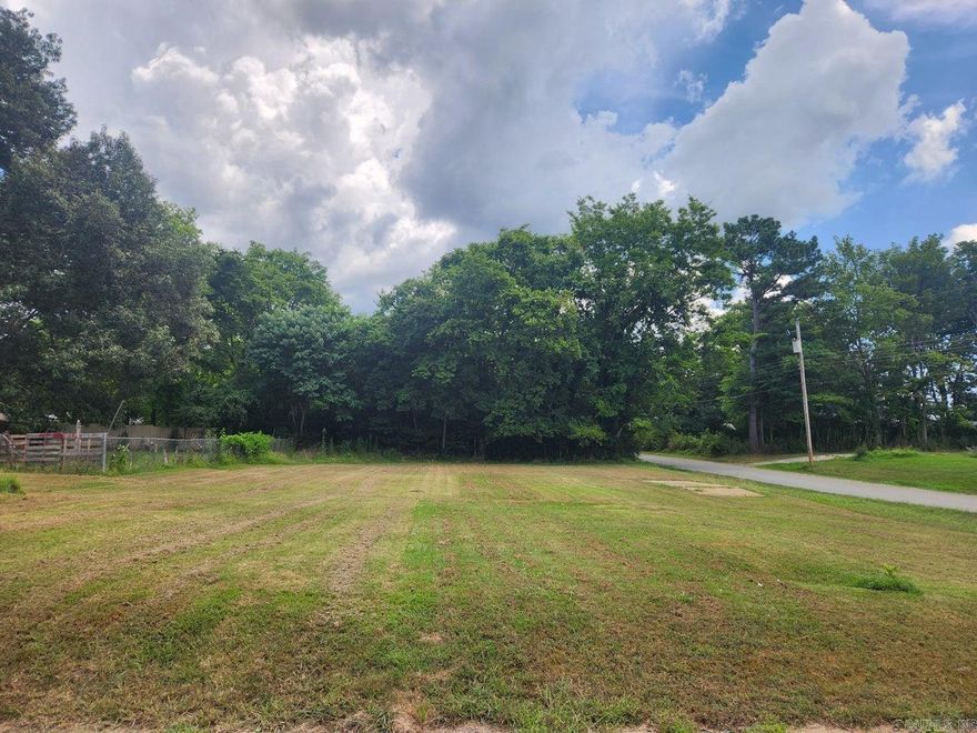 Looking for a place to build a home? This lot is cleared with some mature trees in the back. Utilities are available by the road. This could be the place for your new project.