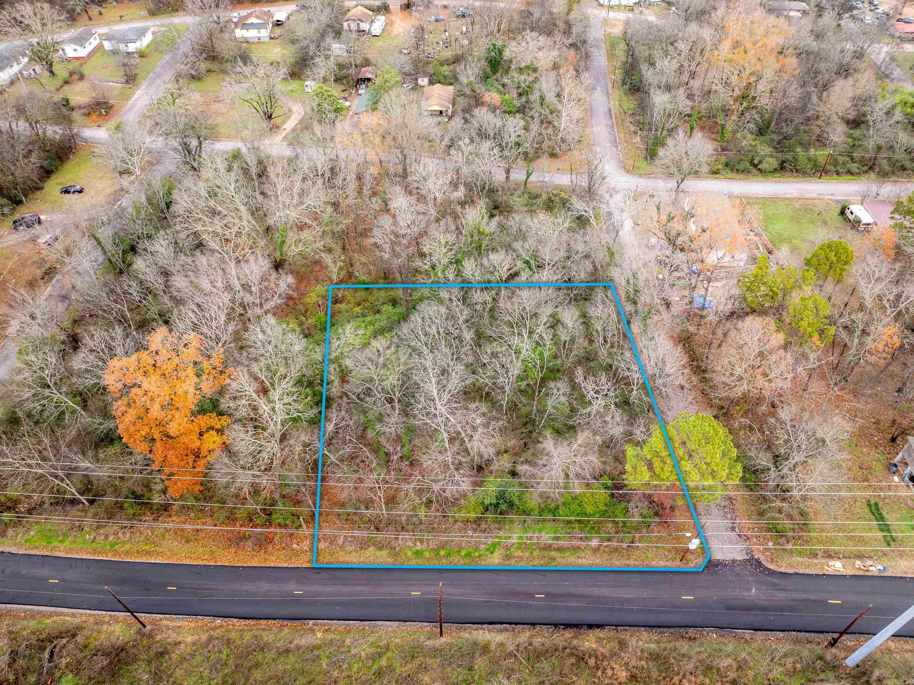 Three wooded residential lots close to Downtown and Oaklawn! Utilities at the road. Drive by today to see the full potential!