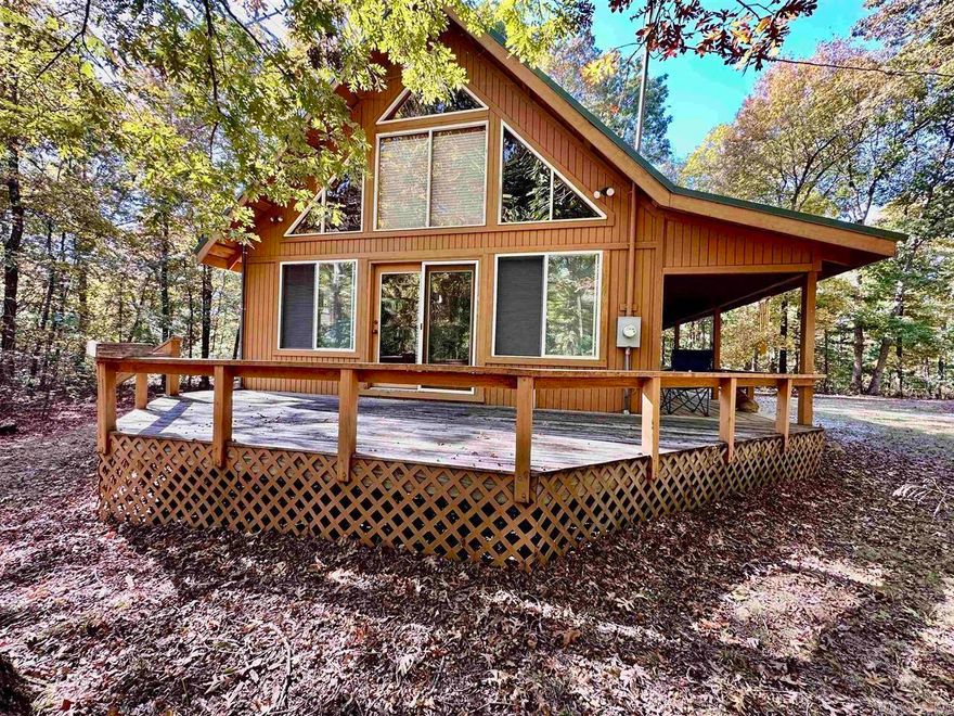 Situated right on the outskirts of Mountain View, this A framed cabin situated on 3.04 acres offers privacy while also being close enough to town to enjoy all that the town square has to offer. This property has 2 bedrooms and 1.5 bathrooms, plus an amazing loft with built-ins giving you ample space for your storage needs. The open floor plan provides an atmosphere perfect for family gatherings while the wraparound deck provides an extension of your living space. Perfect for enjoying your morning coffee or having a barbecue in the evenings. The surrounding area is rich with natural beauty, making it an ideal spot for outdoor enthusiasts. You can enjoy hiking, fishing, or simply exploring the scenic landscapes that the Ozark National Forest has to offer. This property with its unique blend of comfort, functionality, and connection to nature, making it a wonderful place to call home or a perfect retreat from the hustle and bustle of everyday life. Schedule your showing today!