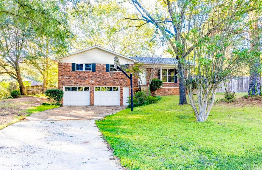 This gem is located right in the center of "Old Bryant" on an oversized lot with so many mature trees! Recently renovated in 2021, updates include new paint, floors, cabinets, countertops, appliances, fixtures, bathtubs, vanities, toilets, doors, etc. Updated windows. Roof 2017. The main level has 3 bedrooms & 2 bathrooms, an open floor plan with a wood burning fireplace. There's a finished room in the basement that could be used for a home office, gym, game room or flex space. The screened in porch is perfect for the fall days ahead. Bryant Schools. Schedule your showing today! Agents, see remarks. Full photos coming soon!