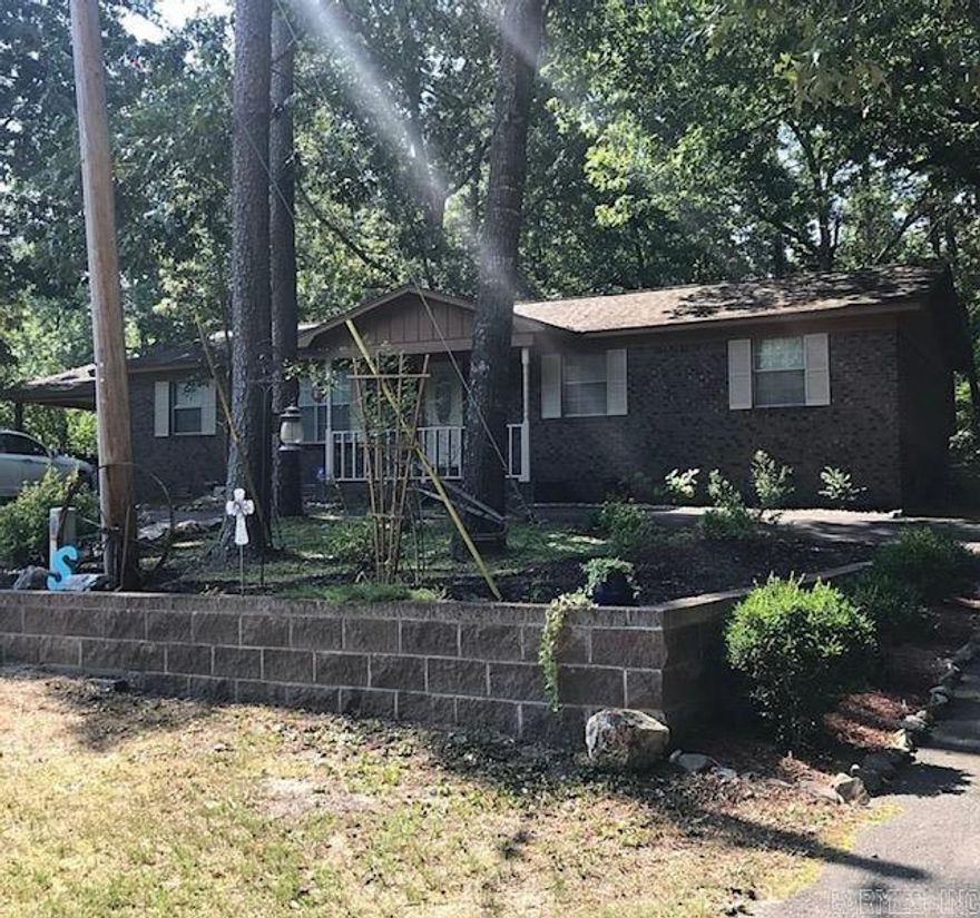 Cute house with fenced in backyard.