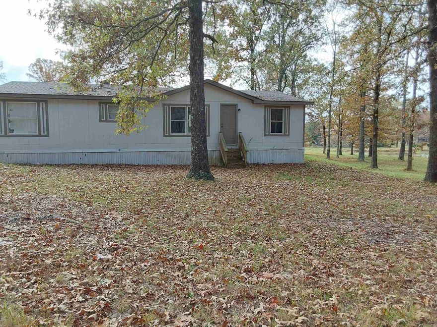 Come live in the country! Located on a dead end road, 3 bedroom, 2 bath mobile home. New LVP flooring. New granite countertops, new cabinetry, kitchen has tiled back splash, stainless sink, the main bedroom has 2 closets, main bath has great tiled shower, 2 vanity sinks. Sits on 1 acre tract. Roof is 4 years old. New heat and air 4 years ago. New water heater. Property sold strictly as is, where is. No disclosure.