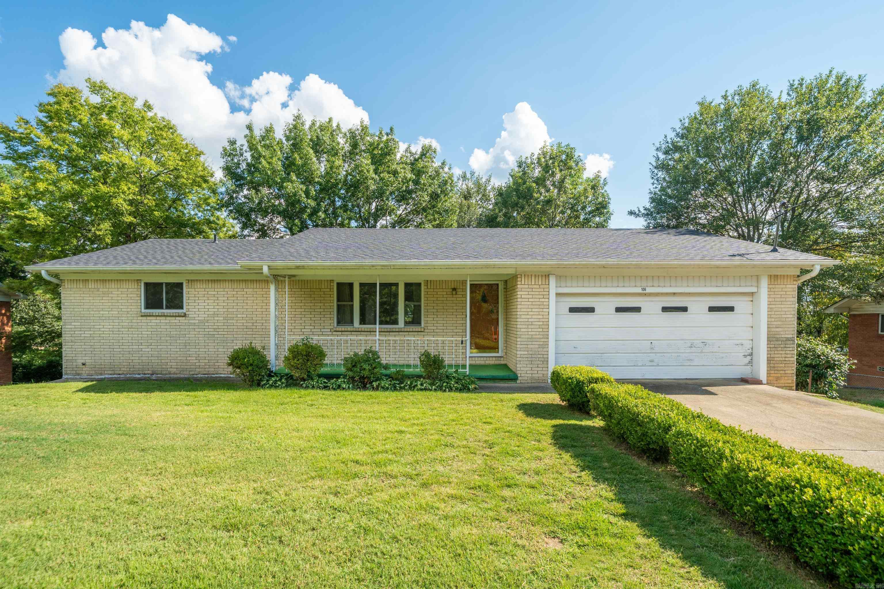Discover this conveniently located three-bedroom, two-bath brick home in the heart of Hot Springs, just minutes from Oaklawn Racing and Casino. The main level offers a comfortable layout with two bedrooms and a full bath, along with a spacious living room, dining area, and kitchen—perfect for everyday living and entertaining. The walk-out basement expands your options with approximately 1,400 additional square feet, featuring a bedroom, full bath, and a generous storage/workshop area to suit your hobbies or projects. A two-car garage on the main level provides easy access and convenience. With its central location, this home keeps you close to dining, shopping, and all the attractions Hot Springs has to offer. New roof installed in August 2025. **no sellers property disclosure** **ALL OFFERS SUBJECT TO COURT APPROVAL in Probate Case No. 26PR-25-556.