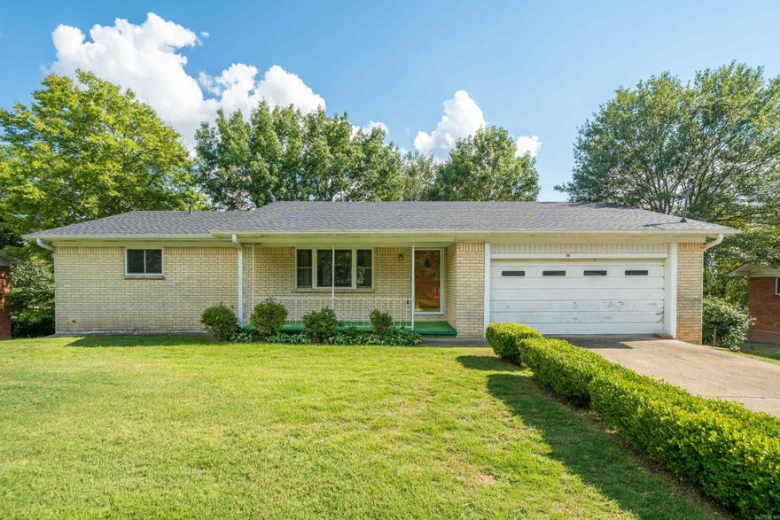 Discover this conveniently located three-bedroom, two-bath brick home in the heart of Hot Springs, just minutes from Oaklawn Racing and Casino.  The main level offers a comfortable layout with two bedrooms and a full bath, along with a spacious living room, dining area, and kitchen—perfect for everyday living and entertaining. The walk-out basement expands your options with approximately 1,400 additional square feet, featuring a bedroom, full bath, and a generous storage/workshop area to suit your hobbies or projects.  A two-car garage on the main level provides easy access and convenience. With its central location, this home keeps you close to dining, shopping, and all the attractions Hot Springs has to offer. New roof installed in August 2025.  **no sellers property disclosure** **ALL OFFERS SUBJECT TO COURT APPROVAL in Probate Case No. 26PR-25-556.