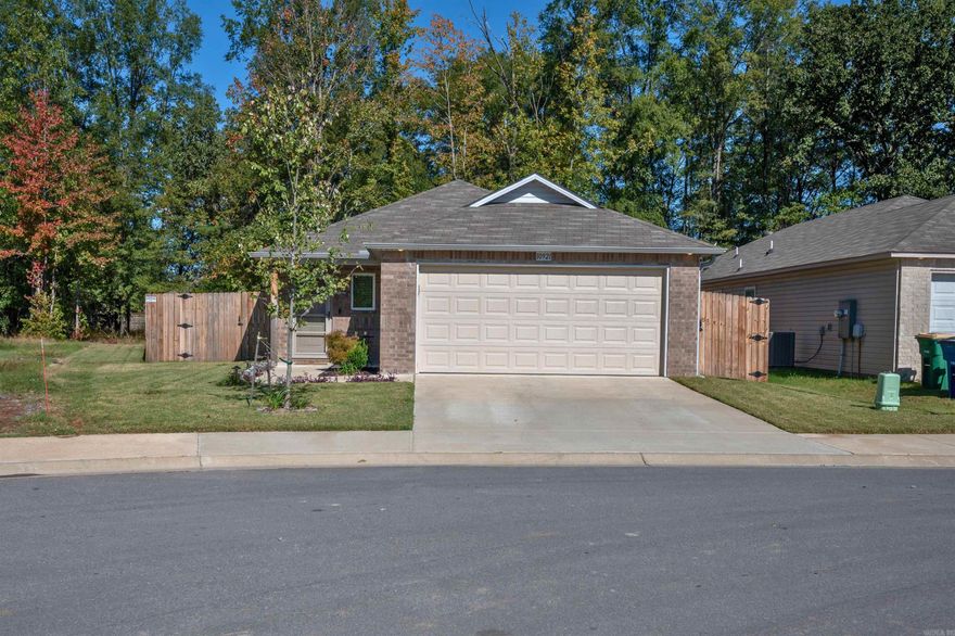 Modern comfort meets everyday convenience in this beautifully upgraded North Little Rock home! With a thoughtful layout, stylish finishes, and a long list of extras, this one truly stands out. Inside, you’ll find luxury vinyl plank flooring throughout, granite countertops, and stainless steel appliances that make every space shine. The primary suite features a double vanity, granite counters, and a spacious walk-in shower—creating a private retreat designed for relaxation. Attention to detail shows up everywhere: under-cabinet lighting, an enclosed 50-gallon water heater, a finished garage, and ceiling fans in nearly every room for comfort and efficiency. Step outside to enjoy an expanded patio, fenced backyard, and storage shed—perfect for entertaining or unwinding. Extras like walkway lighting, gutters, a generator pad and outlet, and an electric car charging station make this home as practical as it is beautiful. Every upgrade tells a story of care, quality, and modern living—all waiting for you at 10921 Lori Kaye Drive.