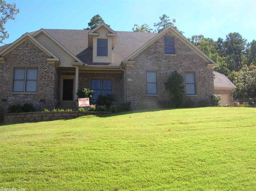 Super Clean , with a greenbelt, The Kitchen is huge with cherry stained cabinets, granite counter tops. All of the downstairs has 1' crown molding. The game room is very big. Very nice media room with projector and screen and built in wine rack. Nice fenced private back yard. Huge laundry with folding vanity, sink and built in Cabinets. There is a mud room. All the tile floors are the 18" tiles. The hardwood are 5" wide plank site finished. master and guest bedrooms are on the main level. 2 double garages.