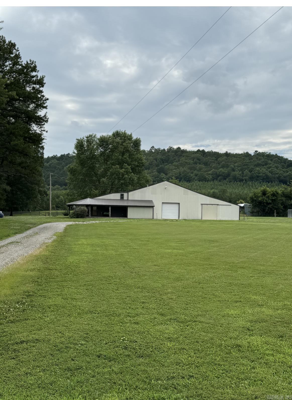 This property is a 1 bed 2 full bath with approx 200 sq ft in the loft area that is not counted in Square footage. In approx 2020 a bedroom and full bath were added. Bath has a walk in tub and a shower. There are 3 mini splits in the house for cooling. A tankless hot water heater in master. Has a finished storage room with entry from outside. You will enjoy sitting on the large porch. There are 6 water spickets around the property. Property is on well water but they have a filter on it and have not had any issues with water. There is also a pond that does not hold water. Has thermal windows and doors. There are 3 horse stalls in barn. The large garage door is automatic for easy parking in shop. Garden spot has organic soil. Fig trees on property. 2 septic tanks. A place for an RV. There is also a 3 bed 2 bath mobile home on property that has its own electric meter. There are 52 Solar Panels (no battery storage). Property backs up to Green Bay Packaging property. Dog Kennels and upright freezer in dog kennel do not convey. Don't let this one get away. SELLER DOES NOT OWN MINERALS. *See Agent Remarks*