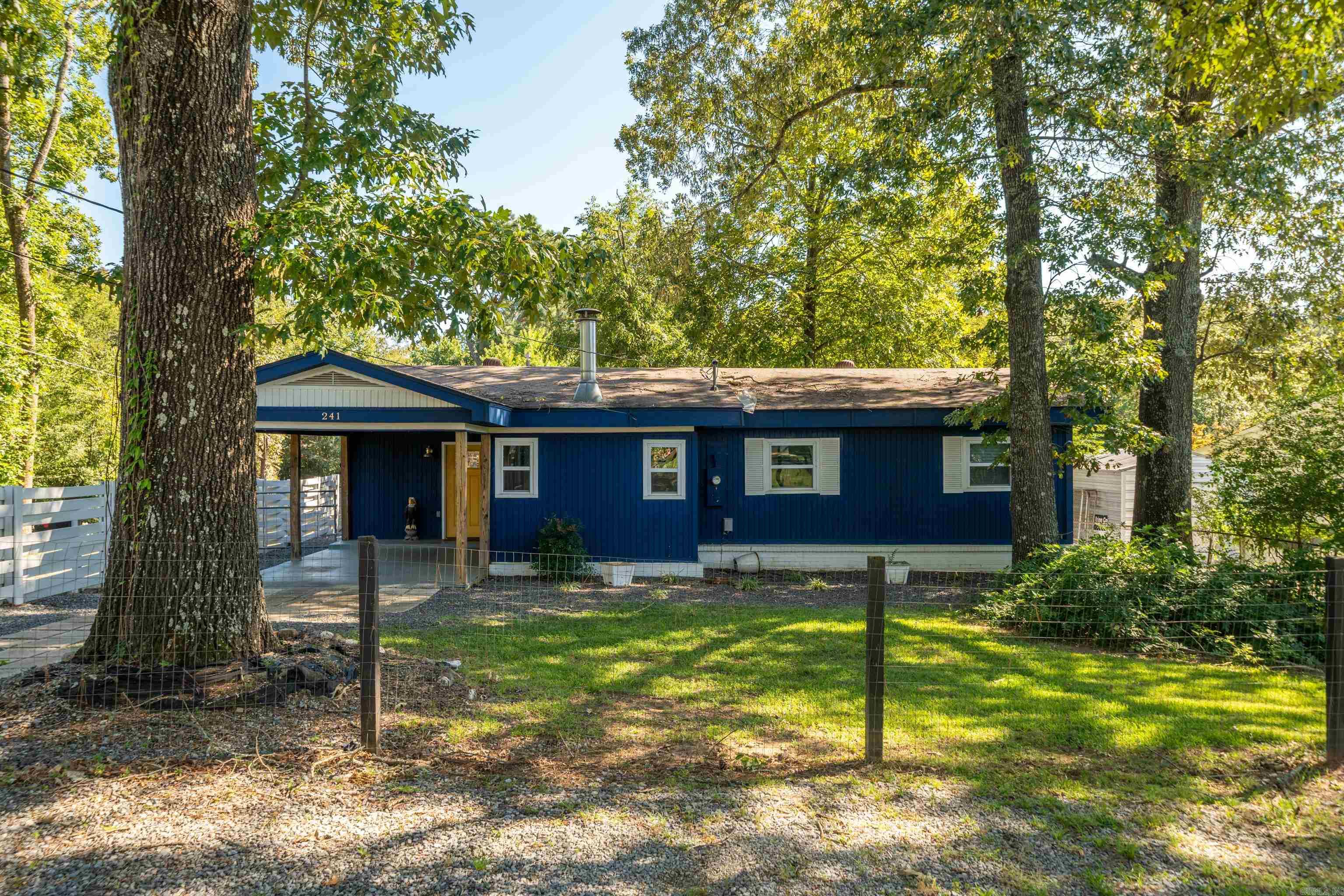Adorably renovated and full of charm, this lakefront home on Lake Hamilton offers a perfect blend of modern comfort and classic lakesidecharacter. Fresh updates throughout include a remodeled kitchen and bathrooms, new windows, stylish flooring, upgraded lighting andplumbing fixtures, interior and exterior paint, a tankless water heater, and cozy gas logs. Outdoors, enjoy the stunning sunset views fromthe brand-new boardwalk with a tanning terrace, gather with friends around the fire pit, or relax on the expansive multi-level deckingsystem overlooking the water. With plenty of parking and a spacious lawn, the property is ideal for both entertaining and quiet weekendescapes. Loaded with personality and move-in ready, this home also presents a fantastic opportunity as a nightly rental in one of HotSpringsā most desirable waterfront locations.