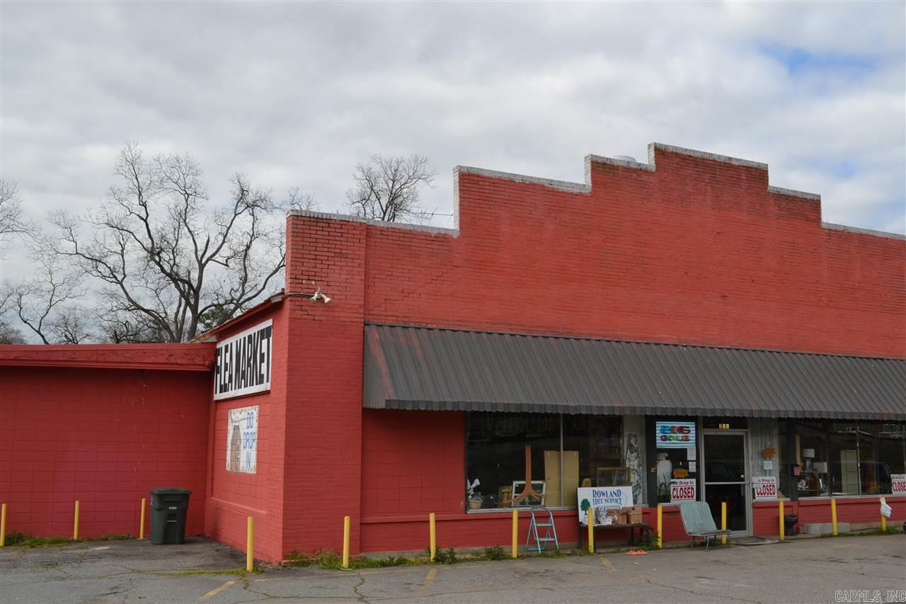 Large flea market centrally located in the heart of Beebe. Have your own business and building...the possibilities are endless with this one. Close to downtown Beebe that is currently opening lots of new businesses. On 1 acre of land with a circle driveway around the property. This building currently has 90 booths that can be rented out. Two outside storage buildings under a canopy. Two bathrooms, multiple ac units. Call today for a showing.