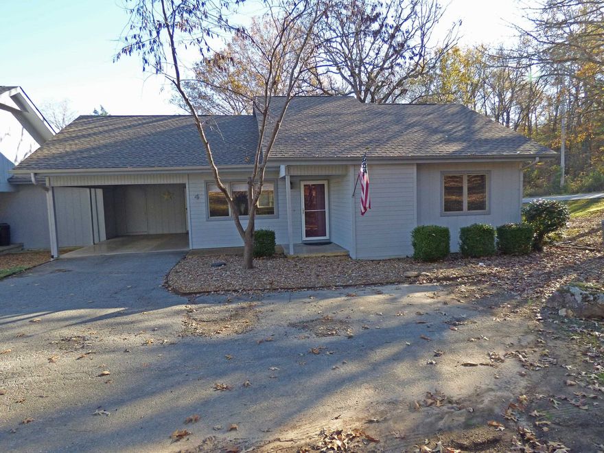 Beautiful One Level Townhouse. Vaulted ceilings in the great room. Has 2 bedrooms, 2 baths, kitchen with new cabinets and countertops, all appliances are included, sun room off the dining room, new flooring, and central heat pump. The roof shingles are 5 years old. Carport and driveway for parking. This townhouse is the end unit in the cul-de-sac providing plenty of privacy.
