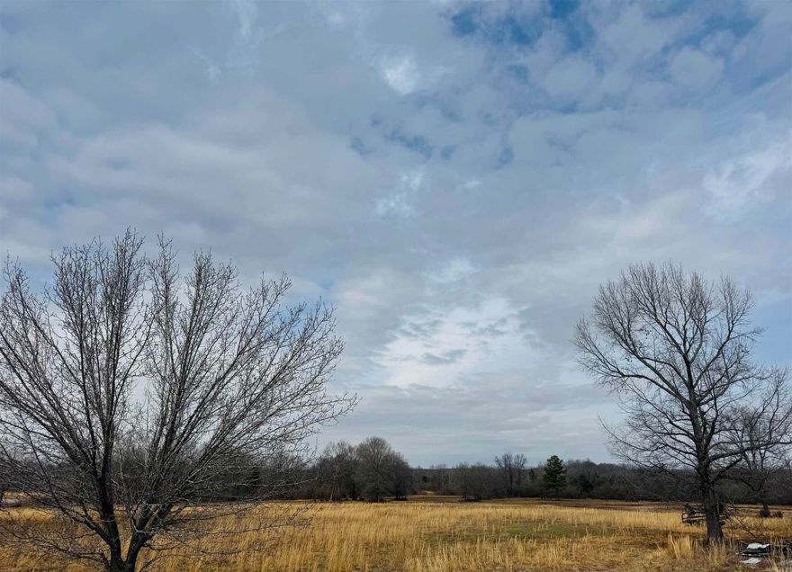 Great piece of property in Sherwood to build your dream home!  This 4 acre tract is in the country yet 15 minutes to town. Lots of wildlife in this area and an awesome setting if your looking for peace and quiet. Single family homes flexible on size and style of house or shop/barn.  There is an additional 4 acres across the street if looking to build multiples... Take a drive and check it out!!