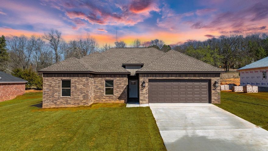 Looking for a 4 bedroom New Construction in Wooster this is it!!! This Split floorplan is designed with family in mind, providing ample space for everyone to enjoy. The large open rooms are perfect for entertaining guests or simply relaxing with loved ones. The astonishing kitchen includes stainless steel appliances, gorgeous granite countertops, pendent lighting and brushed nickel finishes to bring it all together. Dining area The master bathroom includes a custom tiled walk-in shower, jetted tub and a large closet provides plenty of storage space. The spacious rooms throughout the home make it easy to create a cozy and inviting atmosphere that is perfect for family gatherings or quiet evenings at home. Also has a covered back porch, perfect for outdoor activities or just soaking up the sun. Experience love comfort that this home has to offer for you and your family. Call for your private showing today!