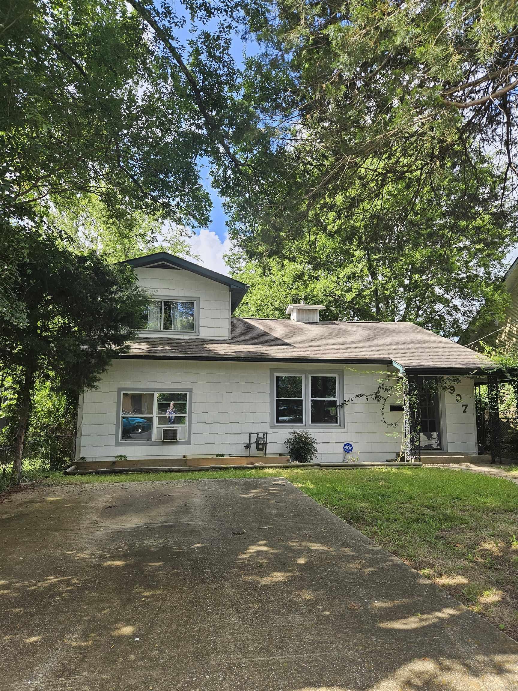 A cute 1400 sq ft cottage home in a quiet neighborhood with off street parking. You will love the large rooms and refinished hard wood flooring. The kitchen overlooks the front living area and leads into a separate eating area. The large and fenced back yard provides opportunities to try your hand at gardening and room for children and pets. Conveniently located close to shopping and the downtown area. Refrigerator conveys with the home. Refrigerator conveys with property.