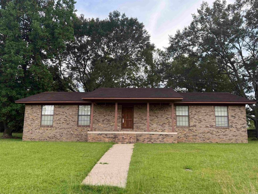 Brick home located in Greenwood Subdivision, close to city park and within walking distance to Nashville public schools.  Home offers over 2,460 sq. ft. of living space, 3 bedrooms and 3 baths, large kitchen, den with fireplace and large formal living/dining room.  CH/CA, city water and city sewer, double carport on a oversized corner lot.  Home is being sold " AS IS" with no disclosures.