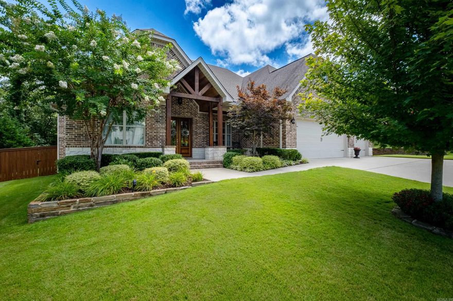 Beautiful 5 bedroom 4 1/2 bathroom home in immaculate condition in a highly sought-after Chenal neighborhood! This stunning & elegant home has a great open layout & lives like a one level. The main floor features a nice foyer open to formal dining room & home office/study w/ vaulted ceilings, a large family room w/ fireplace open to kitchen & breakfast nook, spacious primary bedroom w/ spa-like bathroom, stunning half bath w/ brick floors, guest suite with attached bath, two additional bedrooms connected by jack-and-jill bath & an oversized laundry room w/ sink and abundant storage. The chef's kitchen features two islands with barstool seating for six, double ovens, granite countertops, stainless appliances, a large walk-in pantry and a serving pantry/wet bar w/ beverage refrigerator. Upstairs, there is another large bedroom, full bath & walk-in closet (this would also be a great bonus room, in-law area, etc). This home also has a fabulous covered porch w/ fireplace overlooking the private back yard, three-car garage w/ lockers, gorgeous hardwood floors, lots of natural light & more! Refrigerator, washer & dryer stay. Mirabel Ct has golf cart access to Chenal CC. See Agent Remarks.