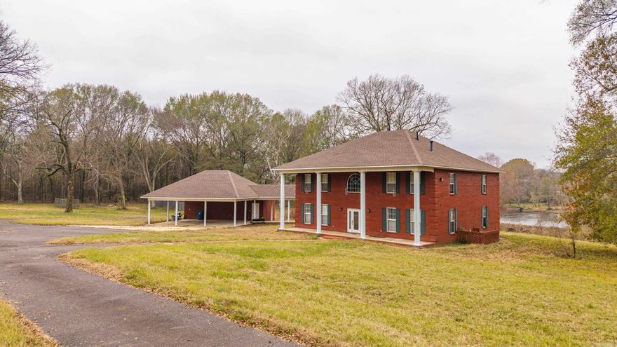 This rare residential retreat offers 7 acres of beautiful land (two lots) with roughly 330 feet of frontage on the Ouachita River, moments from the Tanner Street exit off I-30. This property is ideal for a personal estate that is move in ready, or a commercial business build out as the property is zoned C-2. The spacious 4,500 sq ft home includes a three-car carport and an additional garage apartment. Inside you will find  four bedrooms and three and a half baths with a laundry room and den/living room on each level. The kitchen is large with beautiful quartz countertops and spacious pantry and sits next to a formal dining room. With its generous layout and scenic surroundings, the home provides a comfortable foundation for those seeking both land and lifestyle that takes full advantage of river views and natural surroundings. The combination of riverfront beauty and proximity to town amenities makes this an exceptional opportunity for homeowners and developers alike. This property is also Zoned C-2 Commercial, which gives it endless possibilities. Enjoy the peace of rural living with the convenience of easy access—your vision for this remarkable property can become a reality.
