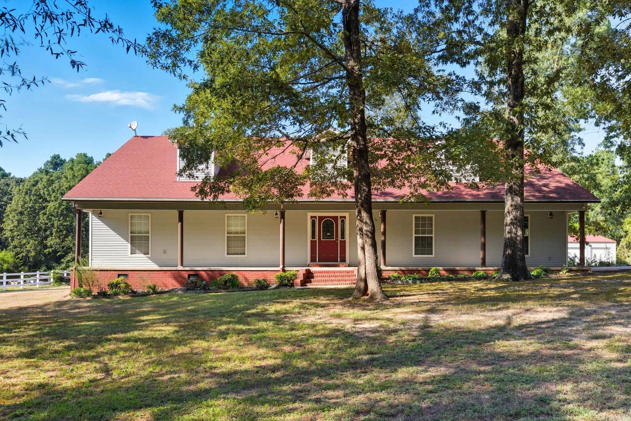 Welcome to country living. Wonderful opportunity to make your dream home in the country on just over 2 acres. 3 bedrooms with 2-1/2 baths, formal dining, kitchen that is open to the family room with woodburning stove insert, and an office/study off the dining. The unfinished space in attic leaves a lot of room to expand up. Shop is 2800 sf with 5 bays. Half of the space is heated & cooled with water and 220. Master Gardener selected landscaping adds a special touch and beauty to the home and property. Have a green thumb? There's a large garden space for your vegetables,flowers, or heart's desire. A well provides water for the yard. Close to W. Lawson Rd., you can make your short drive into Little Rock and avoid the I-30 traffic. In the Bryant School District.