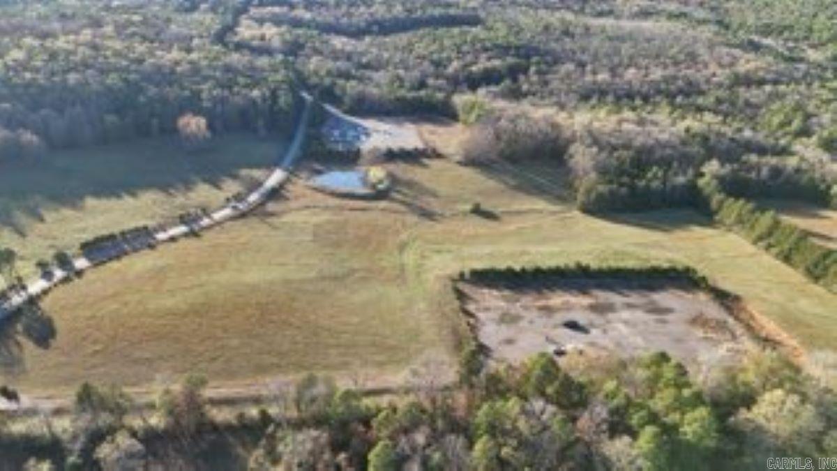 What a beautiful tract of land to build your forever home, hunt, and homestead on. Plenty of pasture, a pond, a creek and already fenced. Building pad already on property to build your dream home. Don't wait to call to view this land right away.