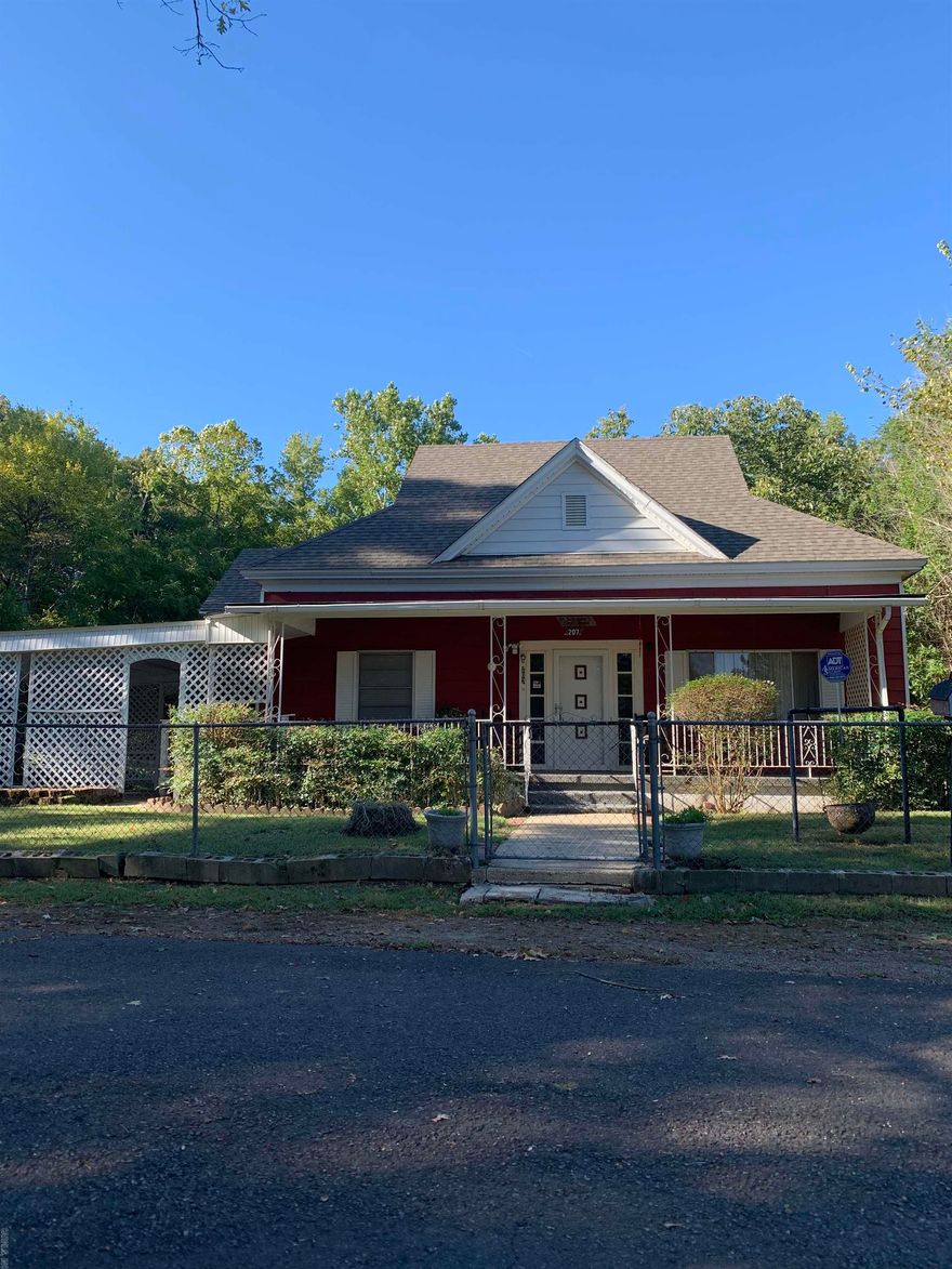 Charming home on a spacious corner lot, just a stroll away from downtown. Nestled two blocks from scenic hiking trails, this property offers both convenience and nature at your doorstep. Featuring a standby generator for peace of mind during power outages and a thoughtful wheelchair ramp from the carport to the front door, accessibility is a breeze. With ample outdoor space, you'll enjoy endless possibilities for gardening, entertaining, or simply unwinding in your private oasis. The property is fully fenced in for added privacy and security, and it boasts new shingles on the roof. Plus, the water heater and HVAC system have recently been upgraded for your comfort. A washer and dryer also convey with the home, making move-in even easier. Don't miss this rare opportunity to own a versatile property that combines urban living with outdoor adventure, all in one.